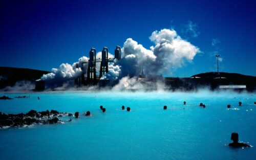 Geothermal heating towers in a crisp blue Icelandic setting