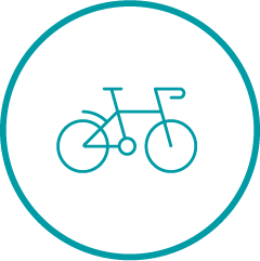 A teal icon with a bicycle in centre